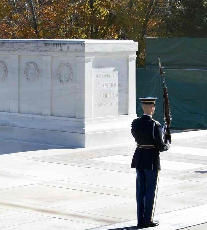 A member of the U.S. military stands guard at the Tomb of the Unknown Soldier in Arlington National Cemetery